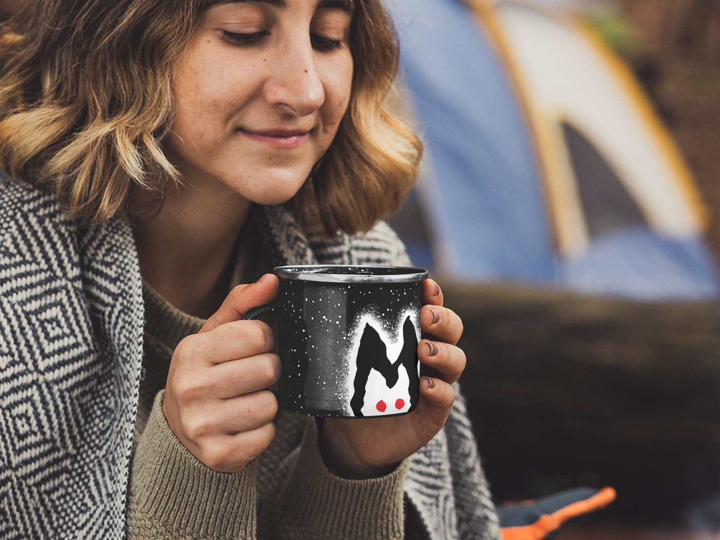 Mothy brand identity campfire enamel mug featuring moth mascot logo